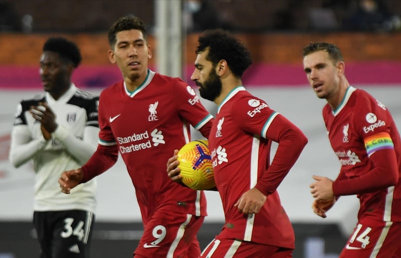 Mohamed Salah of Liverpool celebrates after scoring the equaliser against Fulham on Sunday. EPA