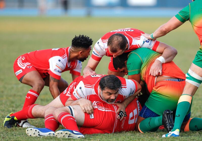 Dubai, United Arab Emirates, November 8, 2019.  
SUBJECT NAME / MATCH / COMPETITION: West Asia Premiership: Dubai Knights Eagles v Dubai Tigers, Domestic top division match.
--  Dubai Tigers in action (red jerseys)
Victor Besa/The National
Section:  SP
Reporter:  Paul Radley