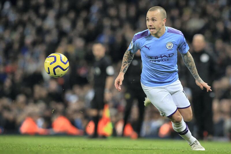 Manchester City's Spanish defender Angelino plays the ball during the English Premier League football match between Manchester City and Manchester United at the Etihad Stadium in Manchester, north west England, on December 7, 2019. (Photo by Lindsey Parnaby / AFP) / RESTRICTED TO EDITORIAL USE. No use with unauthorized audio, video, data, fixture lists, club/league logos or 'live' services. Online in-match use limited to 120 images. An additional 40 images may be used in extra time. No video emulation. Social media in-match use limited to 120 images. An additional 40 images may be used in extra time. No use in betting publications, games or single club/league/player publications. / 