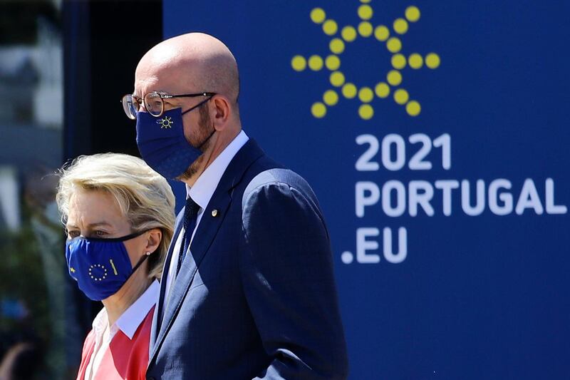 European Council President Charles Michel, right, walks with European Commission President Ursula von der Leyen during an EU summit in Porto, Portugal, Saturday, May 8, 2021. On Saturday, EU leaders hold an online summit with India's Prime Minister Narendra Modi, covering trade, climate change and help with India's COVID-19 surge. (Violeta Santos Moura, Pool via AP)