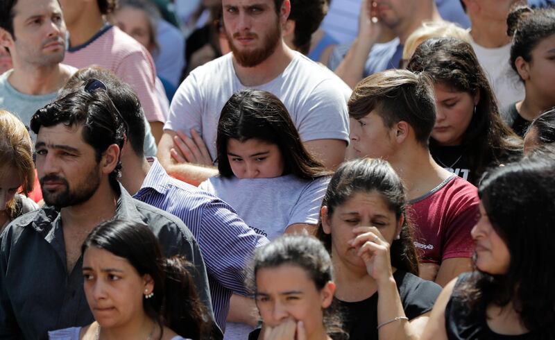 Neighbors of Argentine soccer player Emiliano Sala, wait for his remains to depart for Santa Fe after his wake in Progreso, Argentina. AP Photo