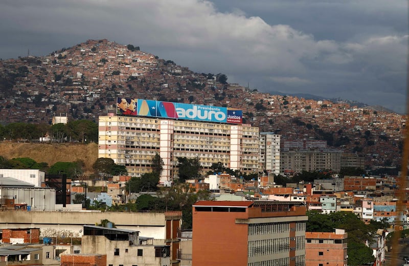A large sign supporting Venezuelan President Nicolas Maduro sits atop a building during the presidential election in Caracas, Venezuela. Marco Bello / Reuters