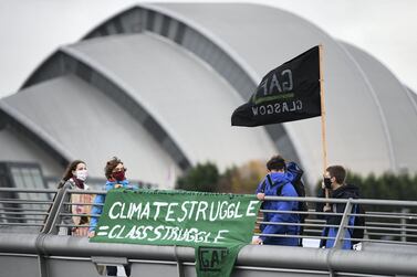 Protesters hold a demonstration marking the delayed Cop26 UN climate negotiations in Glasgow. Getty Images