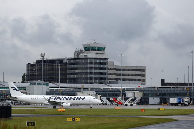 FILE PHOTO: A Finnair Embraer ERJ-190LR aircraft taxis at Manchester Airport in Manchester, Britain June 28, 2016. REUTERS/Andrew Yates/File Photo