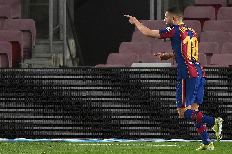 Barcelona's Spanish defender Jordi Alba celebrates after scoring the third goal. AFP