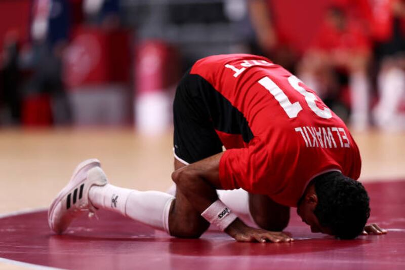 Omar Elwakil of Team Egypt prays after losing.