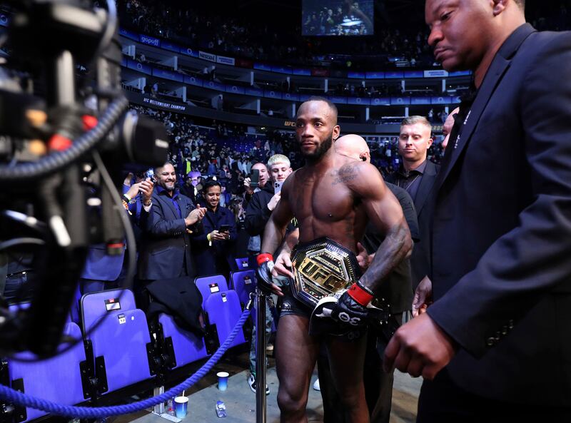 Leon Edwards leaves the octagon after victory against Kamaru Usman at UFC 286. AP