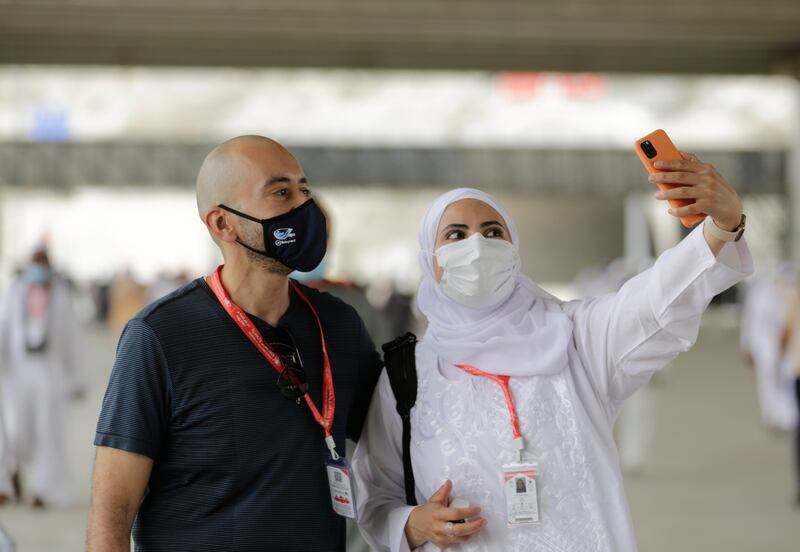 Pilgrims take a selfie after the symbolic stoning ritual during the Hajj in Mina, near Saudi Arabia's holy city of Makkah. AP