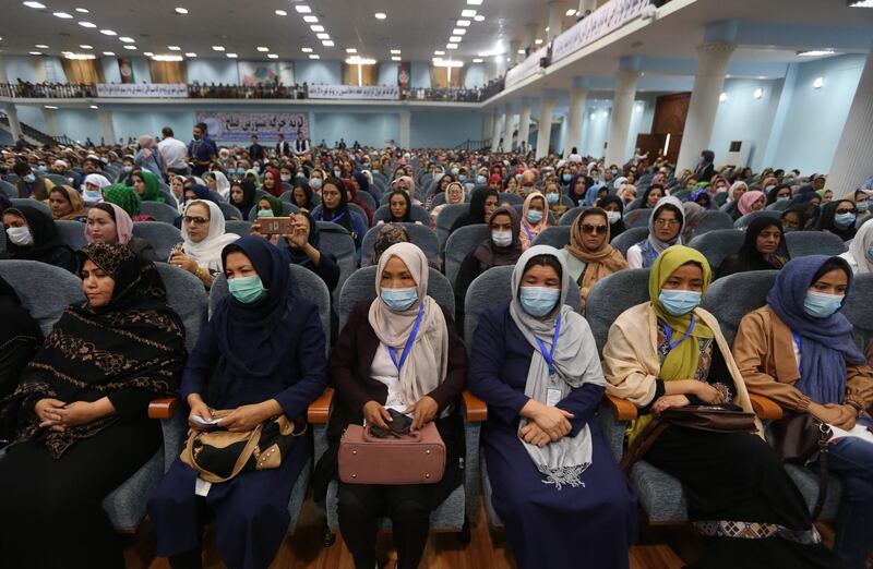 Women members of the loya jirga attend the closing ceremony of the traditional assembly after it agreed to free 400 Taliban prisoners accused of serious crimes.  EPA