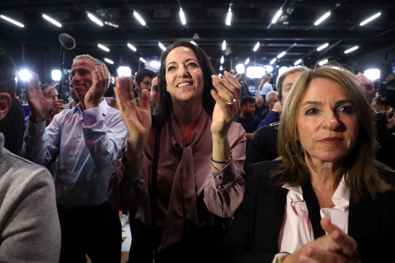 The prime minister's wife Lihi Lapid, centre, cheers her husband. AFP