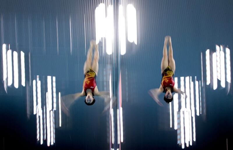 LONDON, ENGLAND - JULY 25:  Divers Ruoling Chen and Hao Wang of People's Republic of China practice synchronized diving during a training session ahead of the London Olympic Games at the Aquatics Centre in Olympic Park on July 25, 2012 in London, England.  (Photo by Adam Pretty/Getty Images)