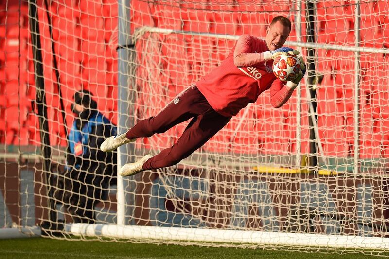 Barcelona's German goalkeeper Marc-Andre Ter Stegen attends a training session at Old Trafford stadium in Manchester, north west England. On the eve of their UEFA Champions League quarter final first leg football match against Manchester United.   AFP