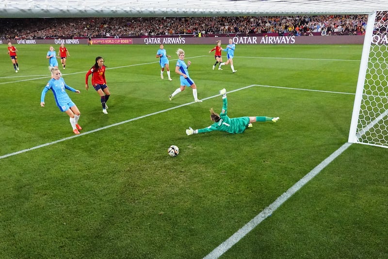 Olga Carmona of Spain scores her team's first goal past Mary Earps of England. Getty