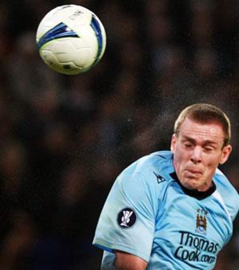 Manchester City defender Richard Dunne is confident that the new faces in the City squad will help them to be a force in next season's Premier League.