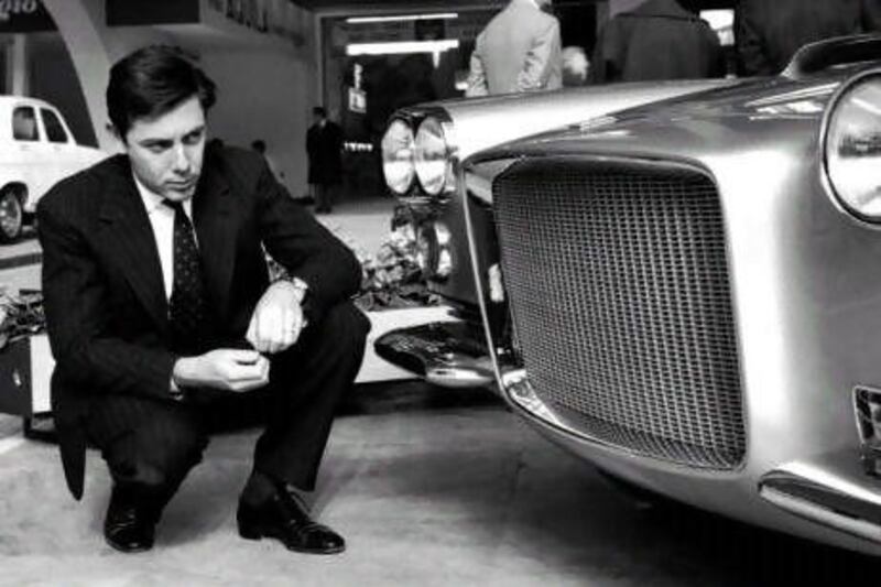 Sergio Pininfarina in 1959, gazing at one of his Ferrari creations. AP Photo