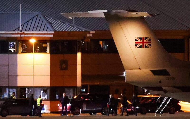 Boris Johnson walks from an airplane after arriving from Brussels at RAF Northolt. Reuters