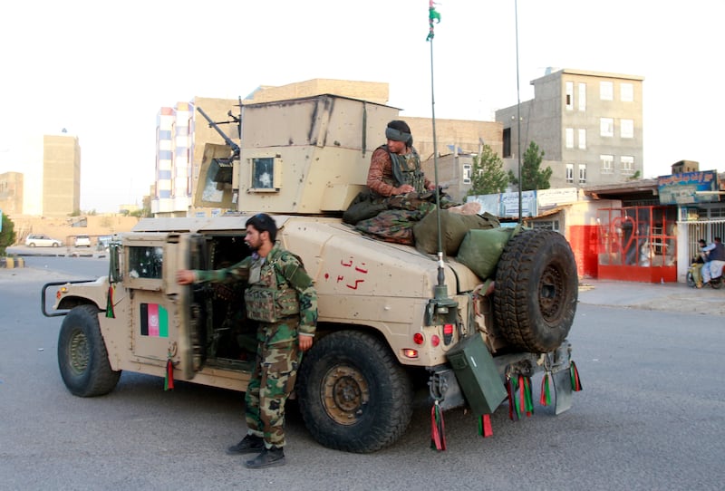 Afghan security personnel patrol the city of Herat. AP