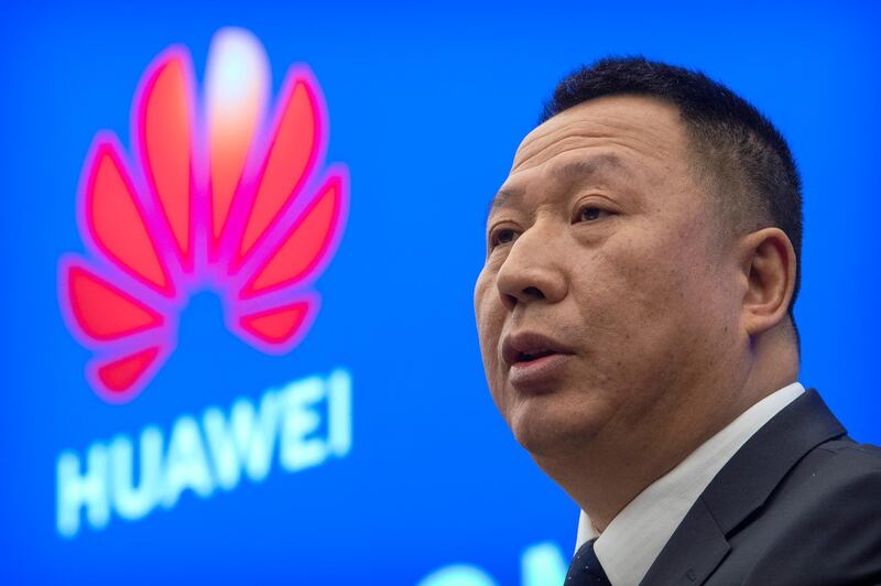 Song Liuping, chief legal officer of Huawei, speaks during a press conference at Huawei's campus in Shenzhen in southern China's Guandong Province, Thursday, Dec. 5, 2019. Chinese tech giant Huawei is asking a U.S. federal court to throw out a rule that bars rural phone carriers from using government money to purchase its equipment on security grounds. (AP Photo/Mark Schiefelbein)