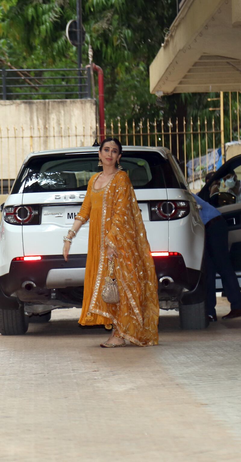 Karisma Kapoor, Ranbir Kapoor's cousin, arrives for the mehndi ceremony.