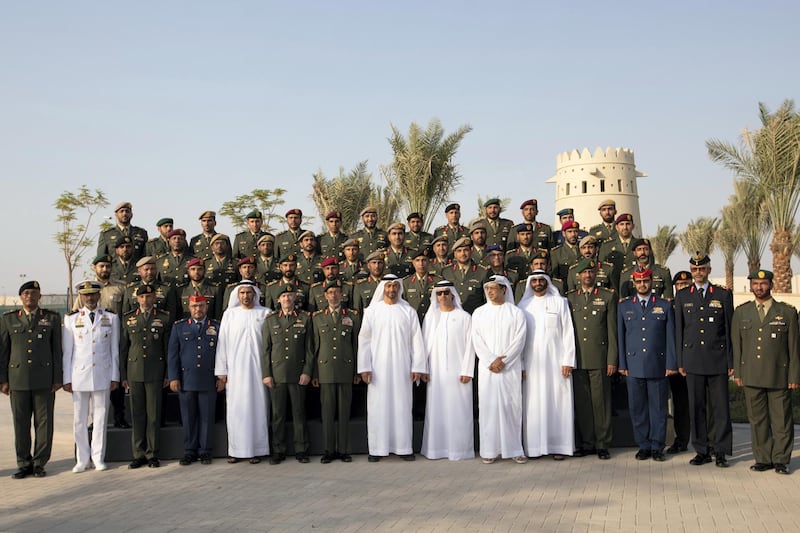 MAHWI, ABU DHABI, UNITED ARAB EMIRATES - September 04, 2019: HH Sheikh Mohamed bin Zayed Al Nahyan, Crown Prince of Abu Dhabi and Deputy Supreme Commander of the UAE Armed Forces (front row 8th L), stands for a photograph, during the inauguration of the Presidential Guard Martyrs Park, at Mahwi Military Camp. Seen with HE Major General Abdul Rahman Sabt Joint Logistic Commander (front row L), Rear Admiral Pilot HH Sheikh Saeed bin Hamdan bin Mohamed Al Nahyan, Commander of the UAE Naval Forces (front row 2nd L), HH Major General Pilot Sheikh Ahmed bin Tahnoon bin Mohamed Al Nahyan, Chairman of the National and Reserve Service Authority (front row 3rd L), HE Major General Ibrahim Nasser Al Alawi, Commander of the UAE Air Forces and Air Defence (front row 4th L), Major General Mike Hindmarsh, Commander of the UAE Presidential Guard (front row 6th L), HE Lt General Hamad Thani Al Romaithi, Chief of Staff UAE Armed Forces (front row 7th L), HH Sheikh Hazza bin Zayed Al Nahyan, Vice Chairman of the Abu Dhabi Executive Council (front row 9th L), HH Sheikh Mansour bin Zayed Al Nahyan, UAE Deputy Prime Minister and Minister of Presidential Affairs (front row 10th L), HE Mohamed Ahmad Al Bowardi, UAE Minister of State for Defence Affairs (front row 11th L), HE Brigadier General Saleh Mohamed Saleh Al Ameri, Commander of the UAE Ground Forces (front row 12th L) and HE Staff Brigadier Pilot Ali Mohamed bin Musleh Al Ahbabi, Director of the Office of the Deputy Supreme Commander of the UAE Armed Forces  (front row 13th L).

( Mohamed Al Hammadi / Ministry of Presidential Affairs )
---