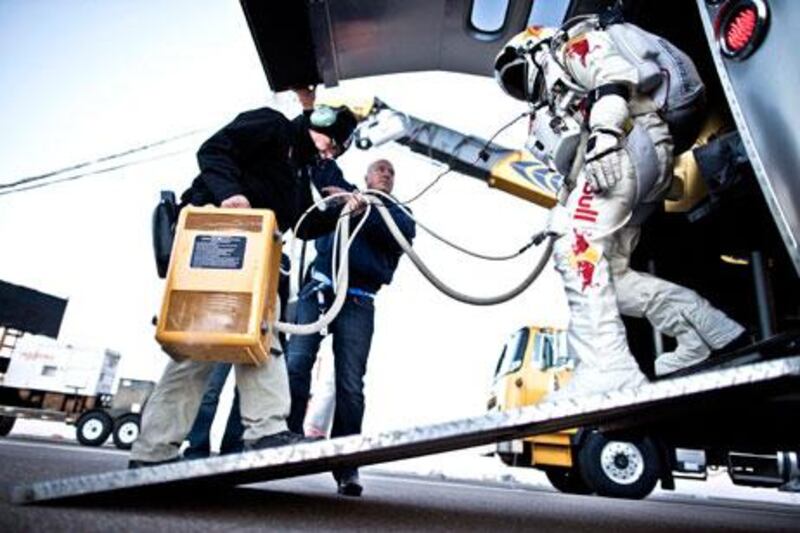 Felix Baumgartner of Austria steps out of his trailer for final preparations before his 37km skydive.