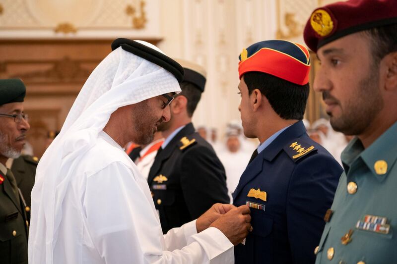 ABU DHABI, UNITED ARAB EMIRATES - April 08, 2019: HH Sheikh Mohamed bin Zayed Al Nahyan, Crown Prince of Abu Dhabi and Deputy Supreme Commander of the UAE Armed Forces (L), presents an Emirates Military Medals to members of the UAE Armed Forces, Ministry of Interior and Abu Dhabi Police, during a Sea Palace barza.

( Ryan Carter / Ministry of Presidential Affairs )
---