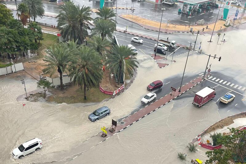 Flooded roads near Ibn Battuta Mall created a watery obstacle course, challenging drivers and pedestrians alike. James O'Hara/ The National