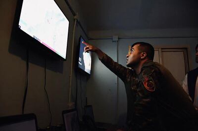 Sami Sadat looks at a map on a screen at a military base in Helmand province in June 2021. AFP