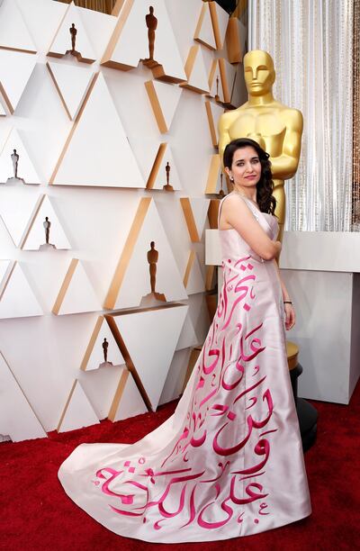 Waad al-Kateab poses on the red carpet during the Oscars arrivals at the 92nd Academy Awards in Hollywood, Los Angeles, California, U.S., February 9, 2020. REUTERS/Mike Blake