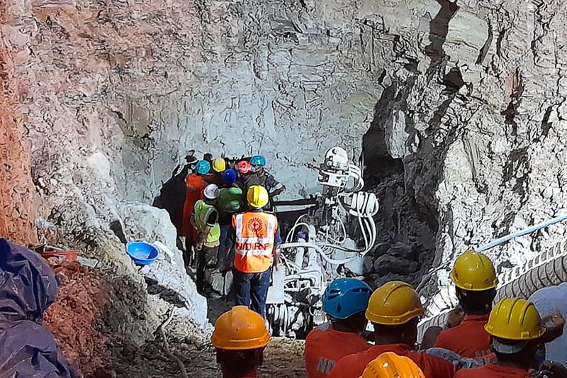 Rescuers in the Indian state of Chhattisgarh dig into a borewell to reach a trapped 10-year-old deaf and mute boy. AFP