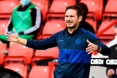 Chelsea's English head coach Frank Lampard gestures on the touchline during the English Premier League football match between Sheffield United and Chelsea at Bramall Lane in Sheffield, northern England on July 11, 2020. RESTRICTED TO EDITORIAL USE. No use with unauthorized audio, video, data, fixture lists, club/league logos or 'live' services. Online in-match use limited to 120 images. An additional 40 images may be used in extra time. No video emulation. Social media in-match use limited to 120 images. An additional 40 images may be used in extra time. No use in betting publications, games or single club/league/player publications. / AFP / POOL / PETER POWELL / RESTRICTED TO EDITORIAL USE. No use with unauthorized audio, video, data, fixture lists, club/league logos or 'live' services. Online in-match use limited to 120 images. An additional 40 images may be used in extra time. No video emulation. Social media in-match use limited to 120 images. An additional 40 images may be used in extra time. No use in betting publications, games or single club/league/player publications.