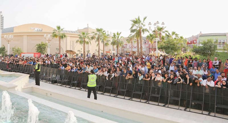 Hundreds of fans line up hoping to get a glimpse of Shah Rukh Khan. Courtesy Bollywood Parks Dubai