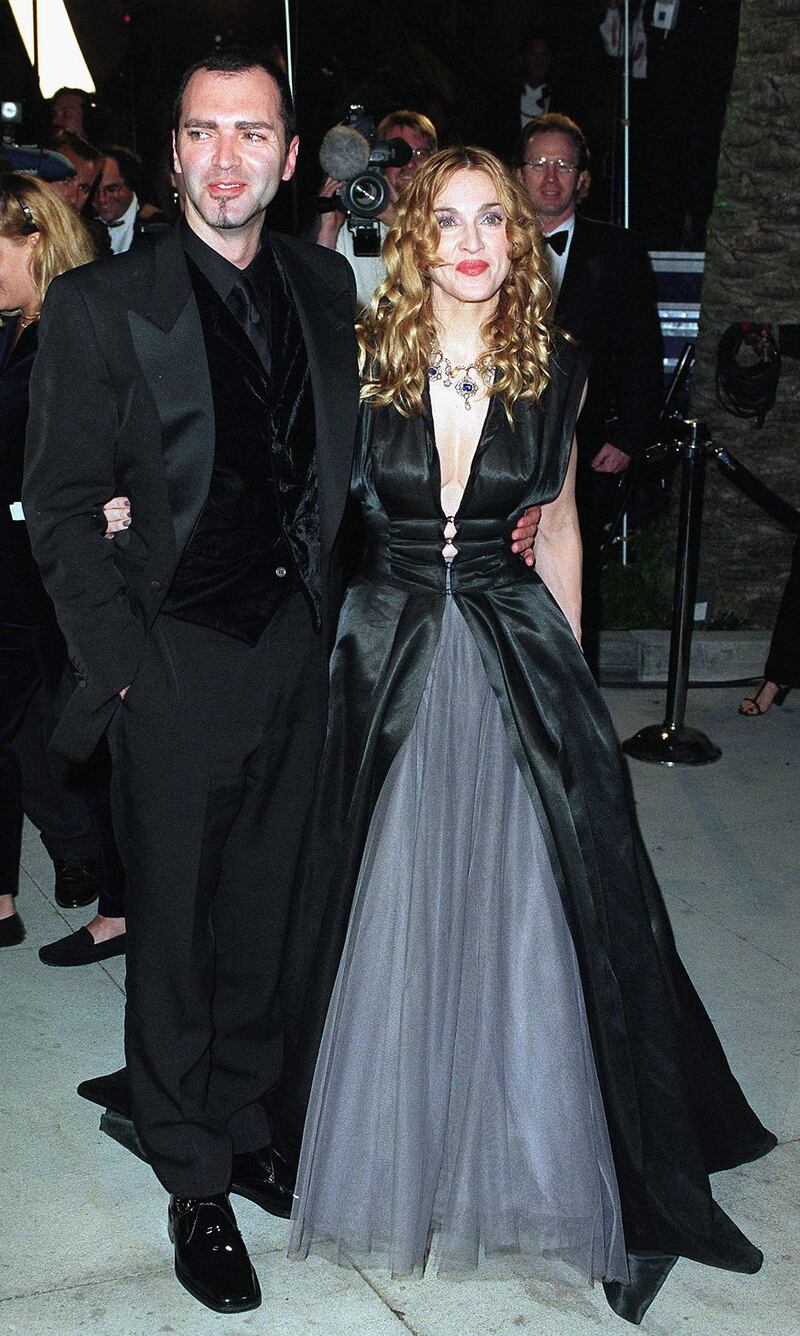 WEST HOLLYWOOD, CA - MARCH 23:  Madonna and her brother arrive at the Vanity Fair Oscar Party at Mortons March 23, 1998 in West Hollywood, California.  (Photo by John Chaple/Getty Images)     