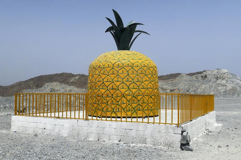 SHARJAH, UNITED ARAB EMIRATES , August 27 – 2020 :- Pineapple shaped structure on Khorfakkan road in Sharjah. Looks like it is a cafe but closed as of now.  (Pawan Singh / The National) For Standalone/Stock/Instagram/Big Picture