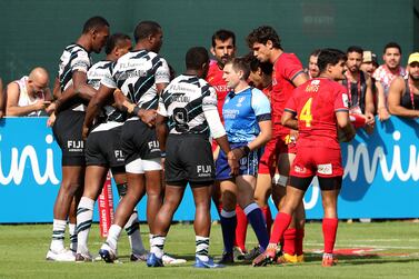 Referee Jaco De Wit during the match between Fiji (black & White) vs Spain (red) held at The Sevens stadium on the second day of the Emirates Dubai Rugby Sevens series in Dubai on 3rd December, 2021. Pawan Singh/The National. Story by Paul 