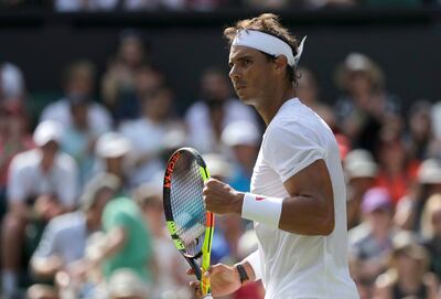 Rafael Nadal, of Spain celebrates winning the second set his men's singles match, against Dudi Sela, of Israel, on the second day of the Wimbledon Tennis Championships in London, Tuesday July 3, 2018. (AP Photo/Ben Curtis)