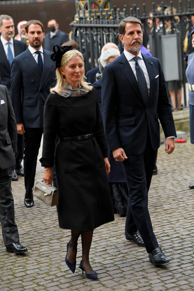 Crown Prince Pavlos and Crown Princess Marie-Chantal of Greece arrive at the service. Reuters