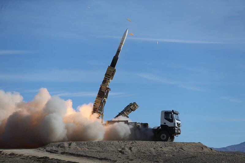 A handout picture made available by the Iranian Army office reportedly shows a Sayad missile fired from the Talash missile system during an air defence drill at an undisclosed location in Iran on November 5, 2018 . - Rouhani said the Islamic republic "will proudly bypass sanctions" by the United States that took effect today targeting the country's oil and financial sectors. (Photo by HO / Iranian Army office / AFP) / === RESTRICTED TO EDITORIAL USE - MANDATORY CREDIT "AFP PHOTO / HO / Iranian Army office" - NO MARKETING NO ADVERTISING CAMPAIGNS - DISTRIBUTED AS A SERVICE TO CLIENTS ===