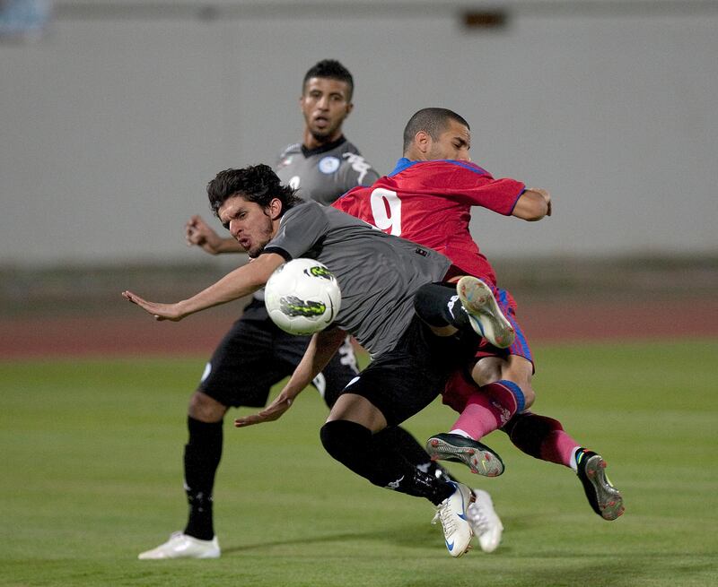Al Ain, United Arab Emirates, Sept. 14 2012, Al Dhafra v Al Shaab- Al Shaab's #9 Nabil Ibrahim finds the net in his first half goal. Sept. 14, 2012 at Khalifa Bin Zayed Stadium. Mike Young / The National