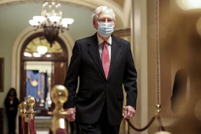 Senate Majority Leader Mitch McConnell, a Republican from Kentucky, walks to his office at the U.S. Capitol in Washington, D.C., U.S., on Monday, Dec. 21, 2020. The House was poised to vote Monday on a massive 5,593-page package of legislation that combines pandemic relief with a bill to fund government operations just hours after lawmakers got the text. Photographer: Oliver Contreras/Bloomberg