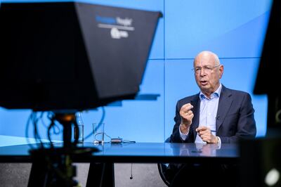 Klaus Schwab, founder and executive chairman of the World Economic Forum, delivers a speech during a virtual media briefing near Geneva. EPA