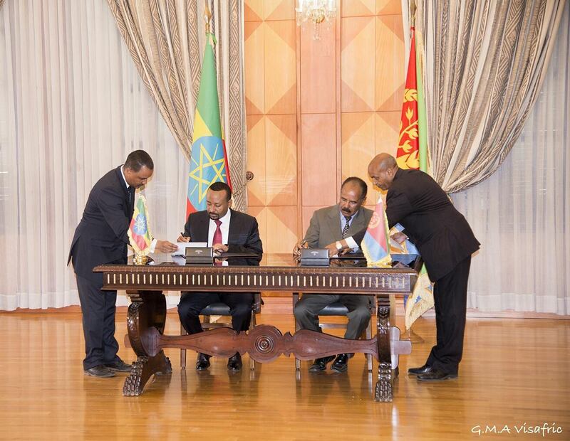 Ethiopia's Prime minister Abiy Ahmed and Eritrean President Isaias Afwerk sign a declaration in Asmara, Eritrea July 9, 2018 in this photo obtained from social media on July 10, 2018. GHIDEON MUSA ARON VISAFRIC/via REUTERS THIS IMAGE HAS BEEN SUPPLIED BY A THIRD PARTY. NO RESALES. NO ARCHIVES. MANDATORY CREDIT.