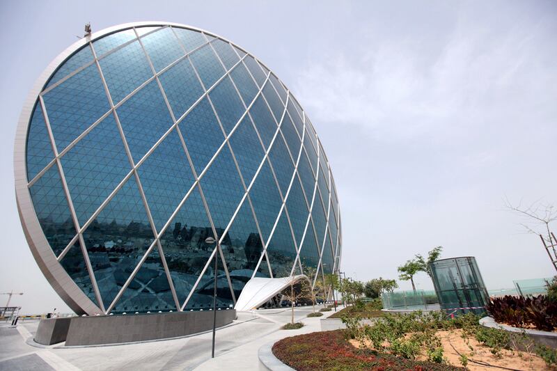 Aldar headquarters in Abu Dhabi. The company reported a robust rise in 2021 income on record development sales. Sammy Dallal / The National