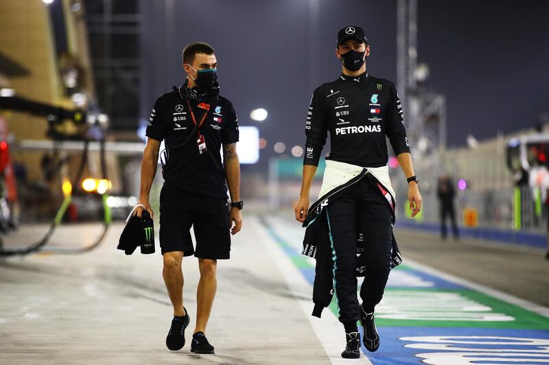 George Russell, right, walks to the grid before the race in Bahrain. Getty
