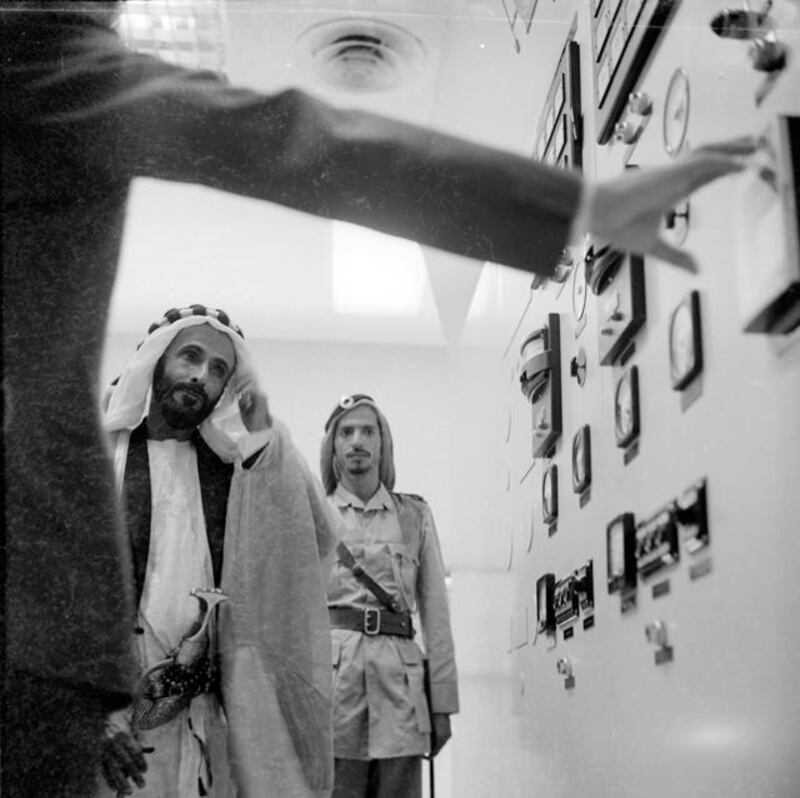 Archival photograph of the Trucial States shot by photographer Guy Gravett in 1962. Sheikh Shakbut bin Sultan Al Nahyan inspects oil production equipment on Das Island, probably 1962, the yearof the first exports. More info to come about man on the right***

Eds note** Karen *** Permission needed before use. Contact Crispin Gravett Cpgravett@aol.com. $150 one print use and 5 years online. 