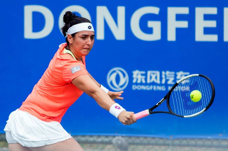 WUHAN, CHINA - SEPTEMBER 24: Ons Jabeur of Turkey returns a shot in the second round match against Elena Rybakina of Kazakhstan on Day three of 2019 Dongfeng Motor Wuhan Open at Optics Valley International Tennis Center on September 24, 2019 in Wuhan, Hubei Province of China. (Photo by VCG/VCG via Getty Images)