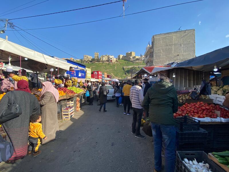 Jordanians prepare for Friday lockdown, purchasing goods at Raghadan Market, Amman. Amy McConaghy / The National