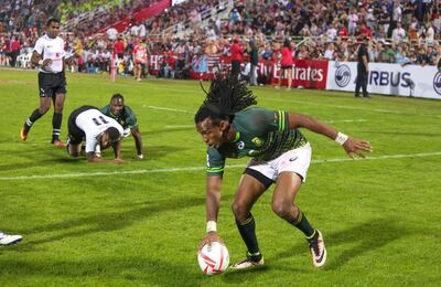 South Africa, in green, will be back in Dubai to defend their Dubai Sevens Series title. The National