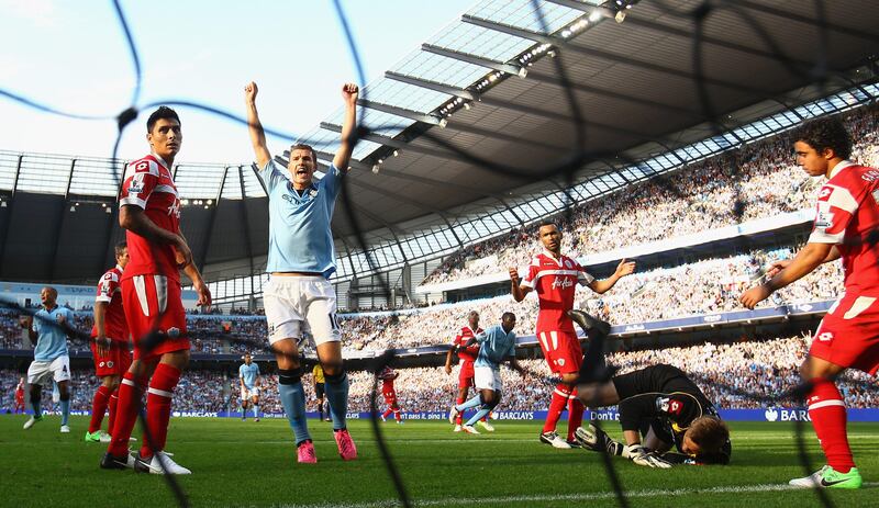 MANCHESTER, ENGLAND - SEPTEMBER 01:  Yaya Toure of Manchester City scores the first goal during the Barclays Premier League match between Manchester City and Queens Park Rangers  at Etihad Stadium on September 1, 2012 in Manchester, England.  (Photo by Clive Brunskill/Getty Images) *** Local Caption ***  151111398.jpg