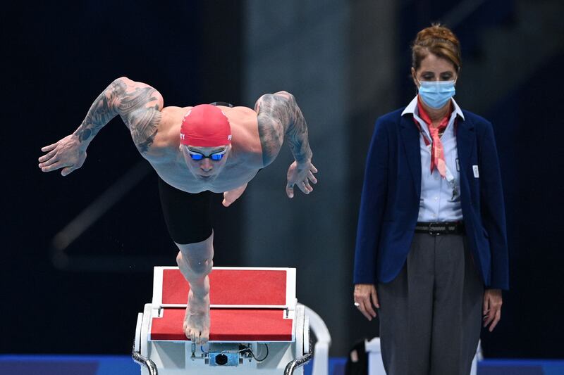 Britain's Adam Peaty dives to start in the final of the men's 100m breaststroke swimming event.